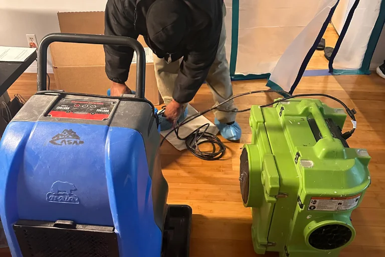 Dehumidifier and air mover drying a Burbank property after water damage