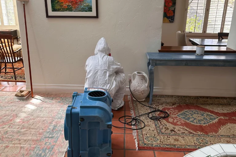 Dehumidifier drying a Beverly Hills living room after water damage