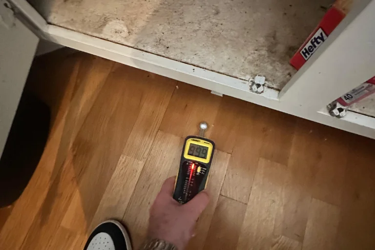 Moisture reading on water-affected flooring in Sherman Oaks