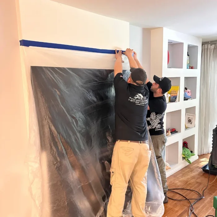 ASAP technicians installing containment during water damage restoration in Burbank